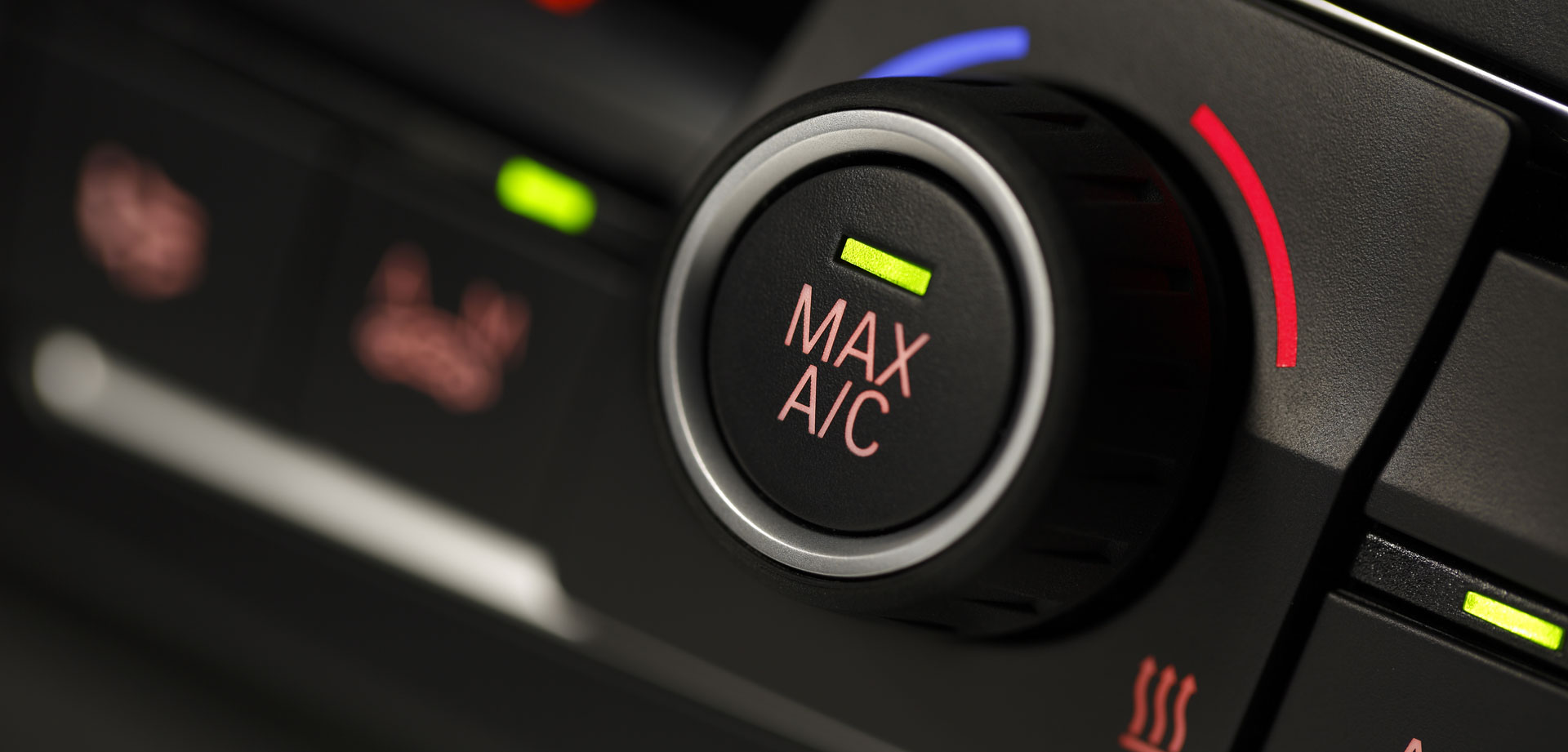 Closeup of Car's A/C knob for adjusting temperature of vehicle