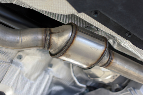 Close up of Catalytic Converter underneath of a vehicle